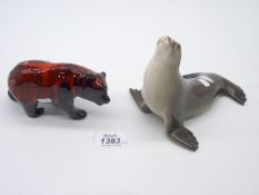 A Canadian flambe Grizzly Bear and a USSR Seal