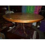 A Walnut snap top Loo Table,