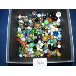 A quantity of marbles to include; ribbon and stone effect.