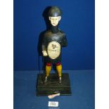 A cast novelty Guinness money box in the form of a man, 'Good for Him and Good for You', 14'' tall.