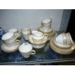 A George Jones Crescent china part Teaset including ten cups and twelve saucers, ten tea plates,