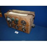 A wooden boxed Electrical continuity Tester from 'The British Central Electrical Company'.