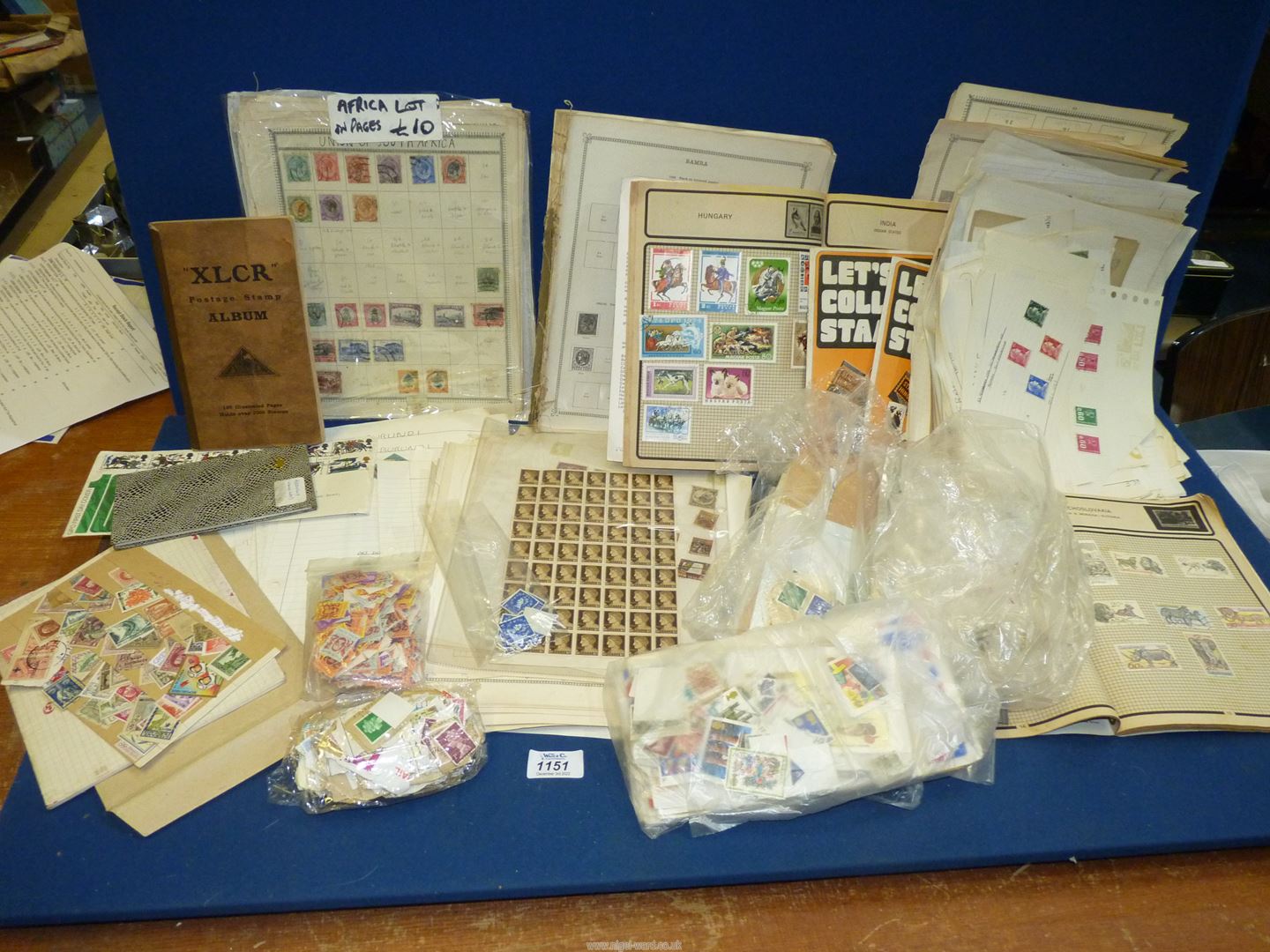 A box of mixed Stamps, many loose and on separate sheets including South Africa, France,