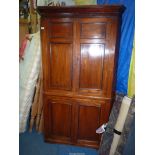 An Elm and other woods full height Corner Cupboard on Cupboard,