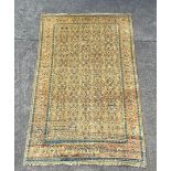 An antique Mahal Wool carpet - West Persia with overall Herati style floral design on camel field.