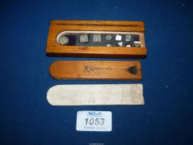 A set of precious metal scales weights, cased.