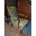 An Edwardian Rosewood framed low open armed Armchair having original olive green upholstery button