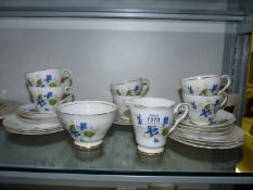 A six setting tea set by Salisbury in blue violet design to include; cups, saucers, side plates,