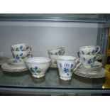 A six setting tea set by Salisbury in blue violet design to include; cups, saucers, side plates,