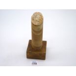 A Grand Tour desk ornament: a miniature variegated marble column,