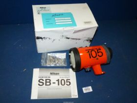A boxed Nikon SB-105 Nikonos Speedlight Waterproof Flashgun with instructions.