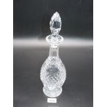 A Waterford crystal 'Colleen' design decanter with mismatched stopper.