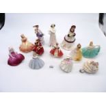 A quantity of Coalport and Doulton small figurines including Buddies, Buttercup etc.