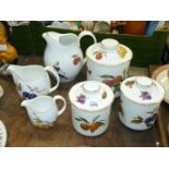 Six pieces of Royal Worcester 'Evesham' china including three storage jars,