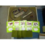 An 'N' gauge model railway layout on thin board (37 1/2'' x 23 3/4'') and packs of building sets