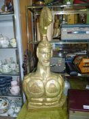 A large carved bust of a Gladiator, gold painted, 36'' tall x 16'' wide.