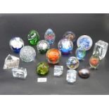 A quantity of paperweights including Isle of Wight, floral, conical, dolphin etc.