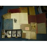 A quantity of old sketch books, albums and ledgers, mostly blank but one with hand written hymns,