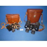 A pair of Mark Scheffel Binoculars with 50mm zoom plus another pair of 8 mag binoculars,
