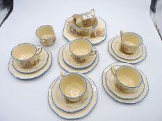 A Coronet Ware by Nell Gwyn part Teaset to include cake plate, six tea plates,