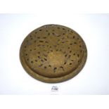 An engraved brass Plate from a late 17th - early 18th century warming pan, 10 1/2'' diameter.