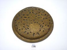 An engraved brass Plate from a late 17th - early 18th century warming pan, 10 1/2'' diameter.
