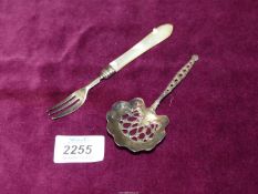 A Sterling silver sifter spoon and a Mother of Pearl handled silver pickle,