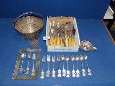 A quantity of bone handled plated cutlery, white metal woven basket,