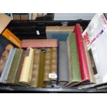 A crate of books: 'A World Portrait of Steam Trains', Robert Browning novels etc.