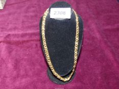 An 18ct gold flat link chain with three small diamonds set in the middle of each link of the lower