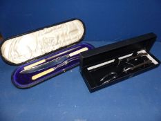 A carving set in a Joseph Rodgers & Sons Sheffield case plus a boxed Oneida carving set.