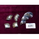 A 925 stamped silver Brooch and matching earrings in wavy design a pair of clip on earrings also