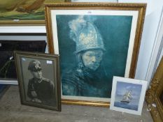 A large framed Rembrandt print titled 'The Man With The Gold Helmet',