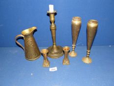 A small quantity of brass including jug, vases, candlestick etc.
