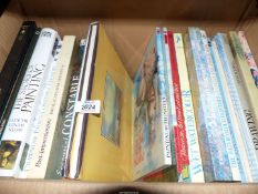 A box of books about drawing, big English watercolours,