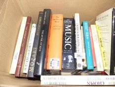 A box of books:'The Outline of Music', Mozart, Gilbert & Sullivan 'Music All Around me etc.