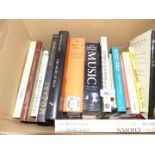 A box of books:'The Outline of Music', Mozart, Gilbert & Sullivan 'Music All Around me etc.