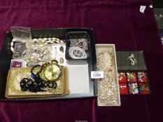 A quantity of costume jewellery including necklaces, cufflinks, earrings etc.