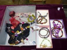 A quantity of costume jewellery to include; earrings, necklaces, liquorice allsorts design, beads,