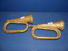 Two brass Bugles marked B.B.I.M. Ltd. 1970 and Mayers & Harrison Ltd. 1966, both battered and a/f.