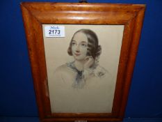 A fine antique burr Maple frame containing a picture of a Victorian beauty.