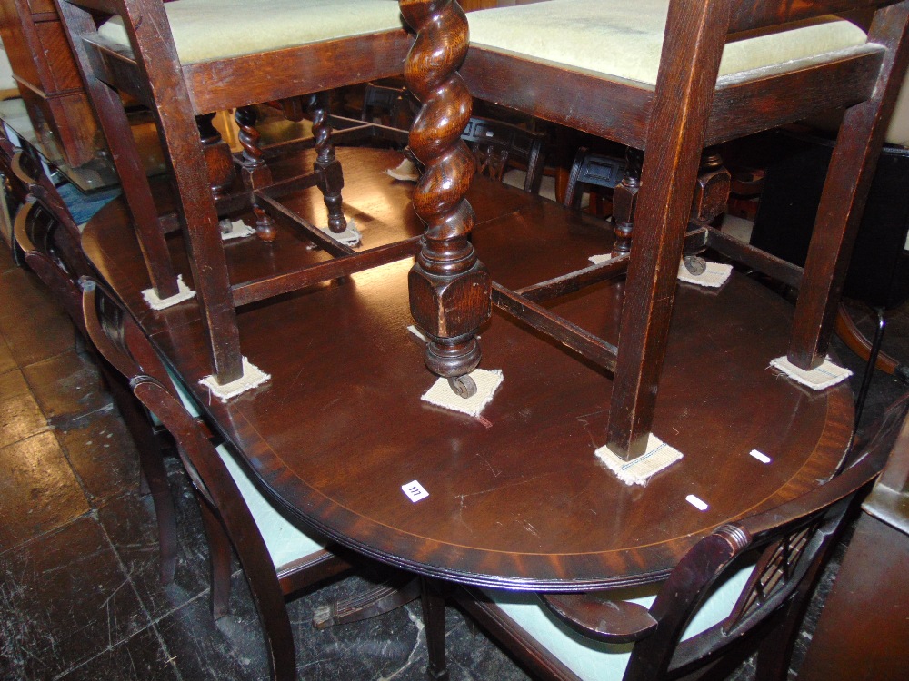 A Regency style dining room suite; table with extra leaf,