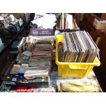 A large collection of vinyl records, albums, singles, pop, rock,