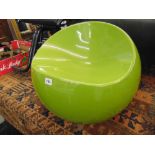 A retro green ball chair,