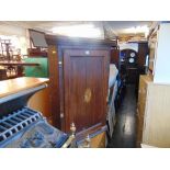 A 19th century inlaid Oak corner cupboard