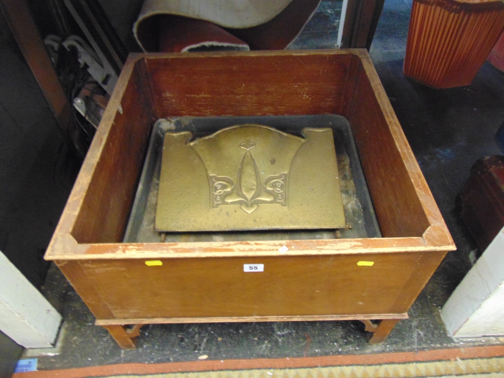 A mahogany floor standing planter