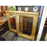 A pair of large gilt frames,