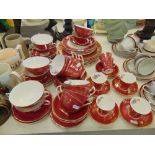 A gilt, red and white Collingwood part, tea,