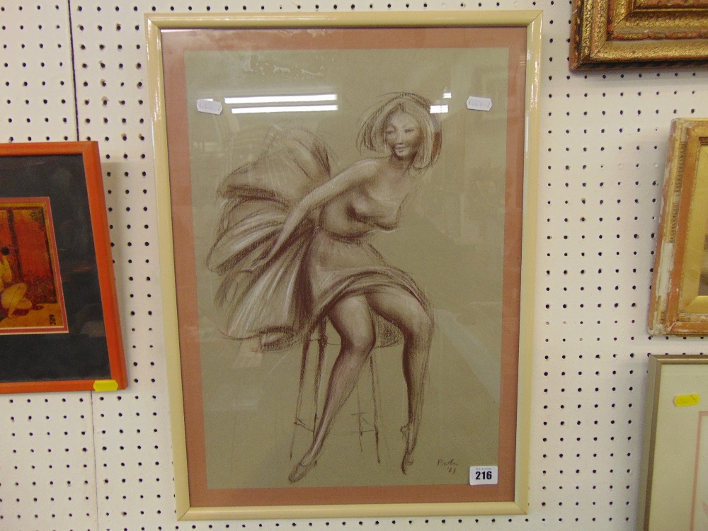 A framed pastel drawing of a young lady,