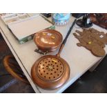 A Copper bed pan and a copper plate food warmer